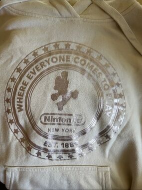 This hoodie shown is official Nintendo New York (Nintendo World) merchandise.